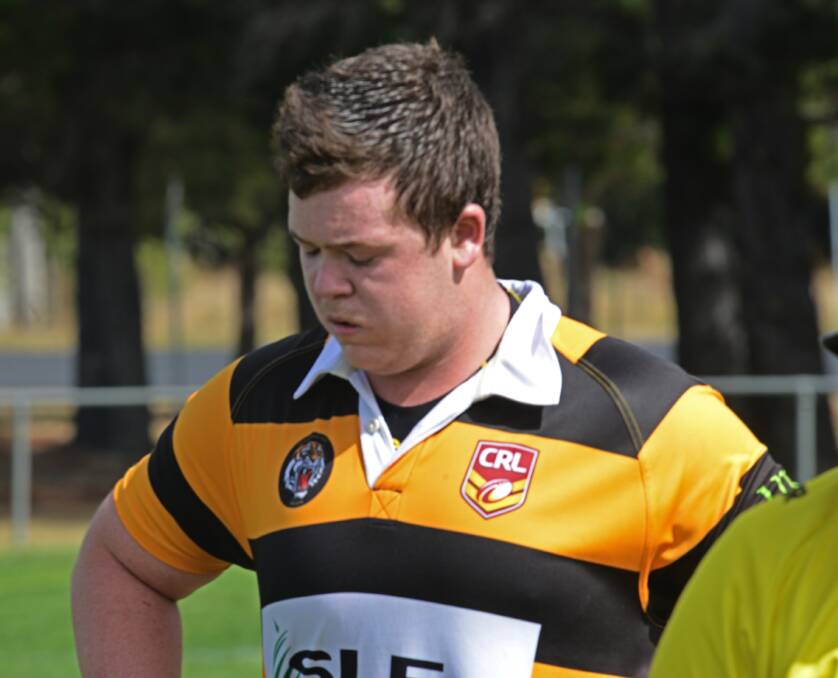 HARD YAKKA: Tigers replacement prop Lincon Smith comes off for a breather. 