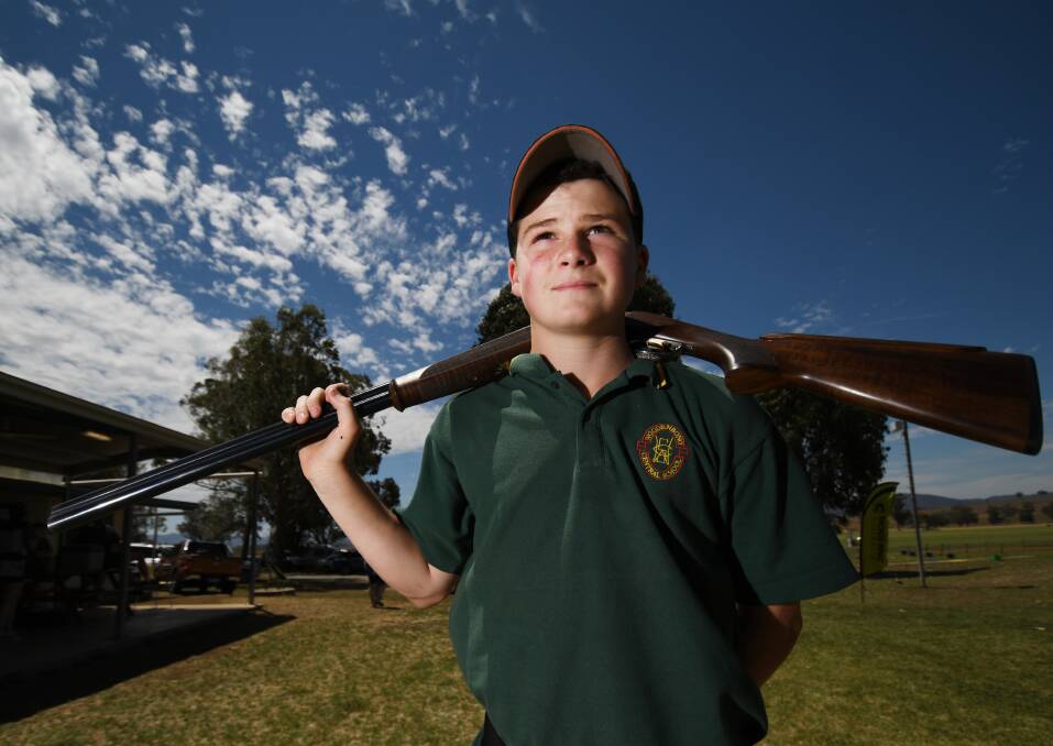 YOUNG GUN: William Pennett, of Farrer, on the sidelines of the Schools Clay Target Competition at Loomberah on Friday. Photo: Gareth Gardner