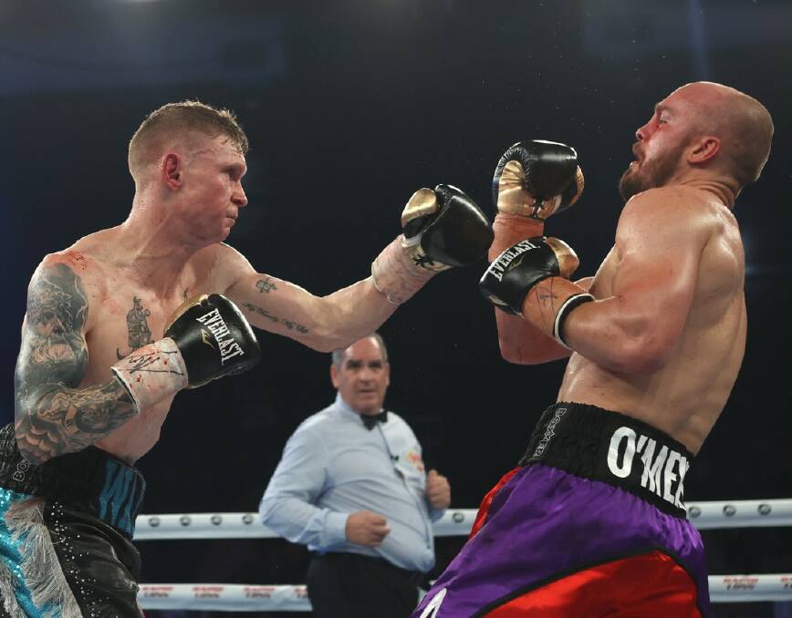 HIGHLIGHT REEL: Wade Ryan pummels Troy O'Meley into submission in his last fight, at Newcastle, in July. Photo: No Limit Boxing