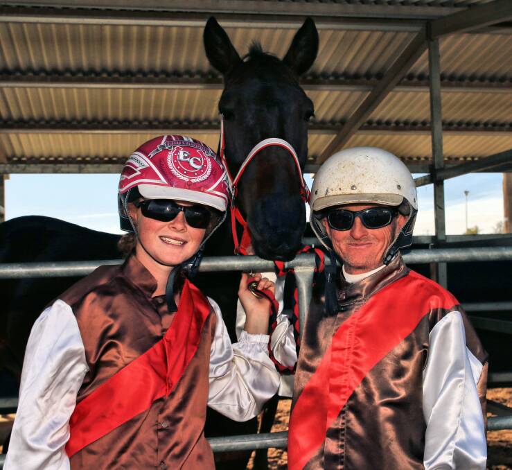 POSTERITY: Elly Chapple with her father Dean and Right On With It, whom the teen piloted to her debut win, at Tamworth last Thursday. Photo: Supplied