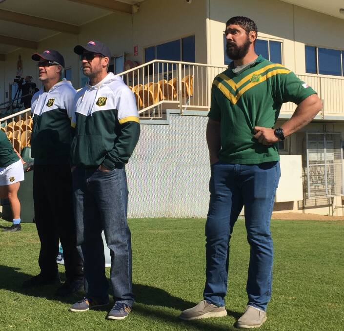 SCHOOL TIES: Farrer coaches Marty Moore (centre) and Tom Learoyd-Lahrs (right) at the NRL Schoolboy Cup clash at Farrer last week.