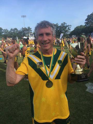 'AN HONOUR': Garth Pennefather savours his men's masters gold medal. Photo: Supplied 