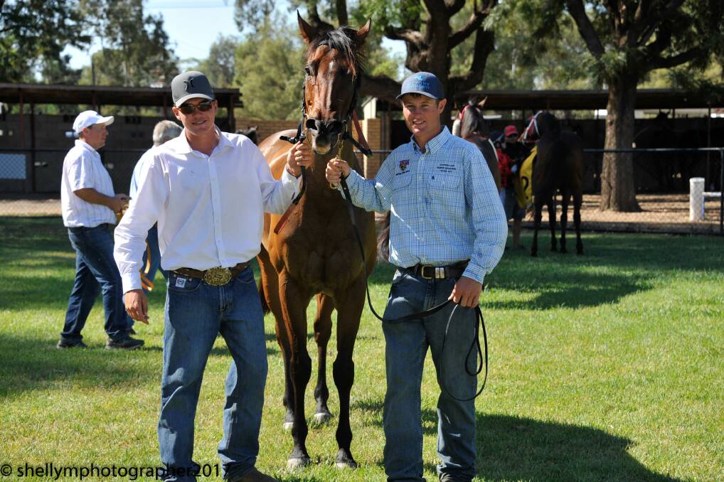 Four More Millers with owner Luke Morgan, right, and his stablehand, Logan Penfold, after the Moree triumph. Photo: bradleyphotos.com.au