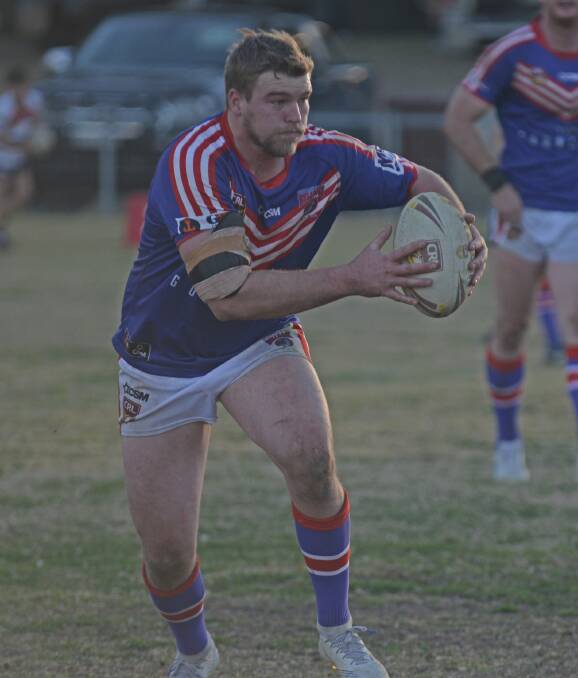 FORM GUIDE: Gunnedah forward Matt Baker in action against the Roosters at Kootingal on Sunday. The former Newcastle first-grader picked up a best and fairest point.