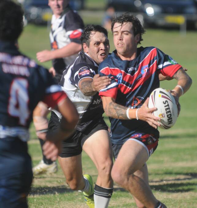 ENERGISED: Roosters No 1 Jordan Sharpe probes the Magpies' defences. Photo: Mark Bode