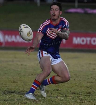 THE CONDUCTOR: Brady does his best to spark a Bulldogs revival in their loss to the Bears in a twilight clash at Kitchener Park this year.