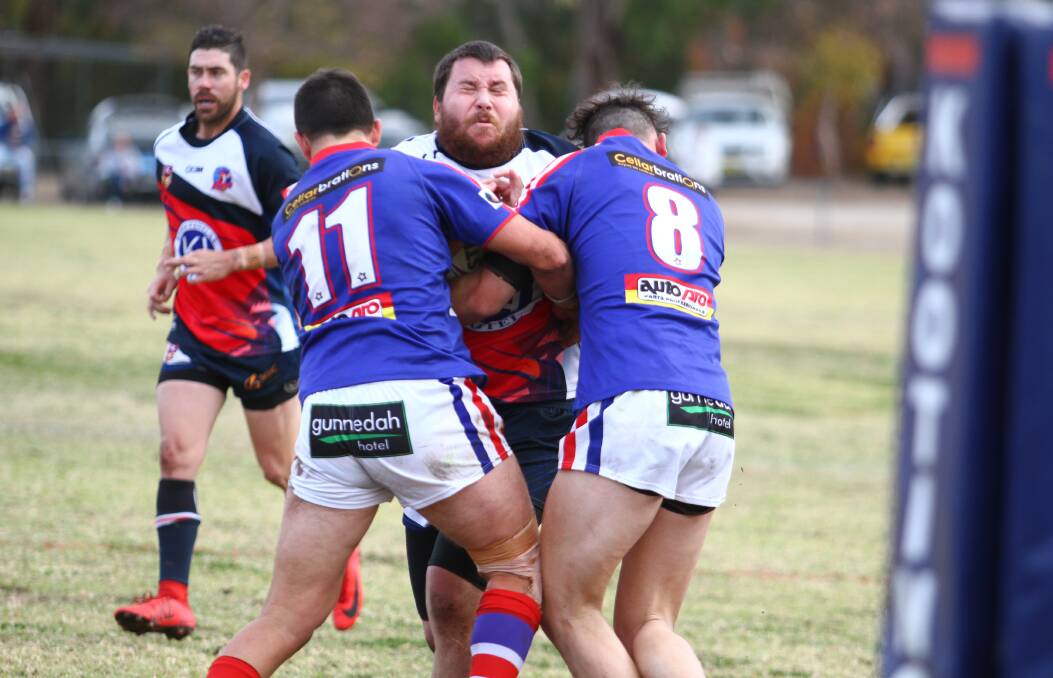 ONE TO CATCH: Roosters prop Brodie Sowter searches for a try in a big win over Gunnedah at Kooty this year. The two sides clash at Kitchener Park on Saturday. Photo: Mark Bode