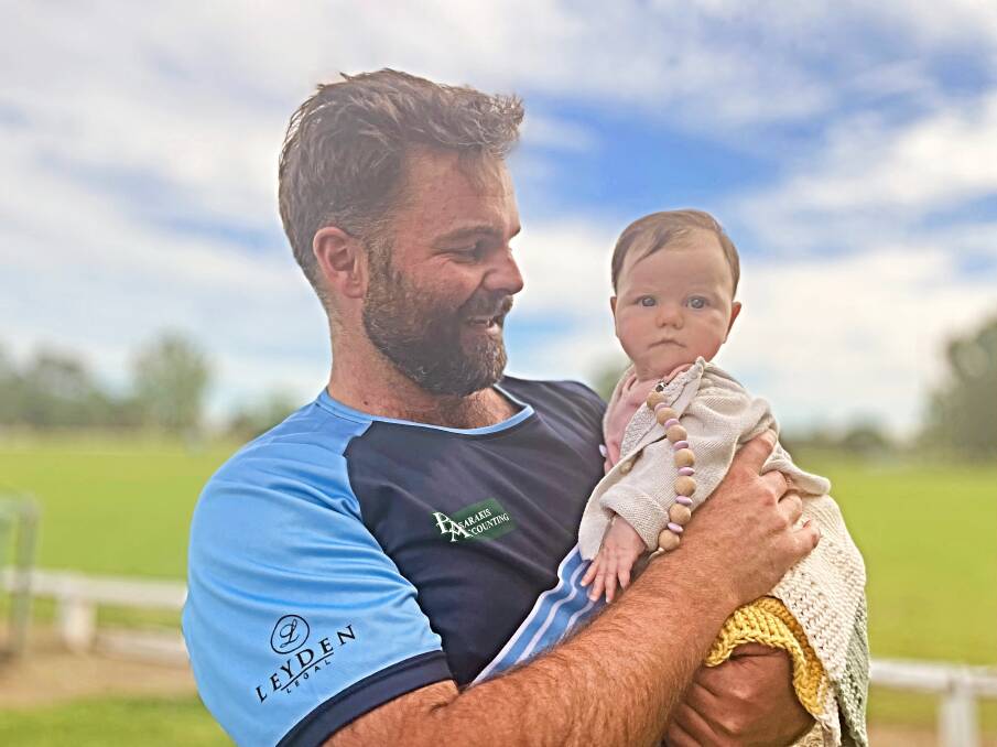 South Tamworth opener Mitch Smith and his daughter, Eadie. Picture by Mark Bode