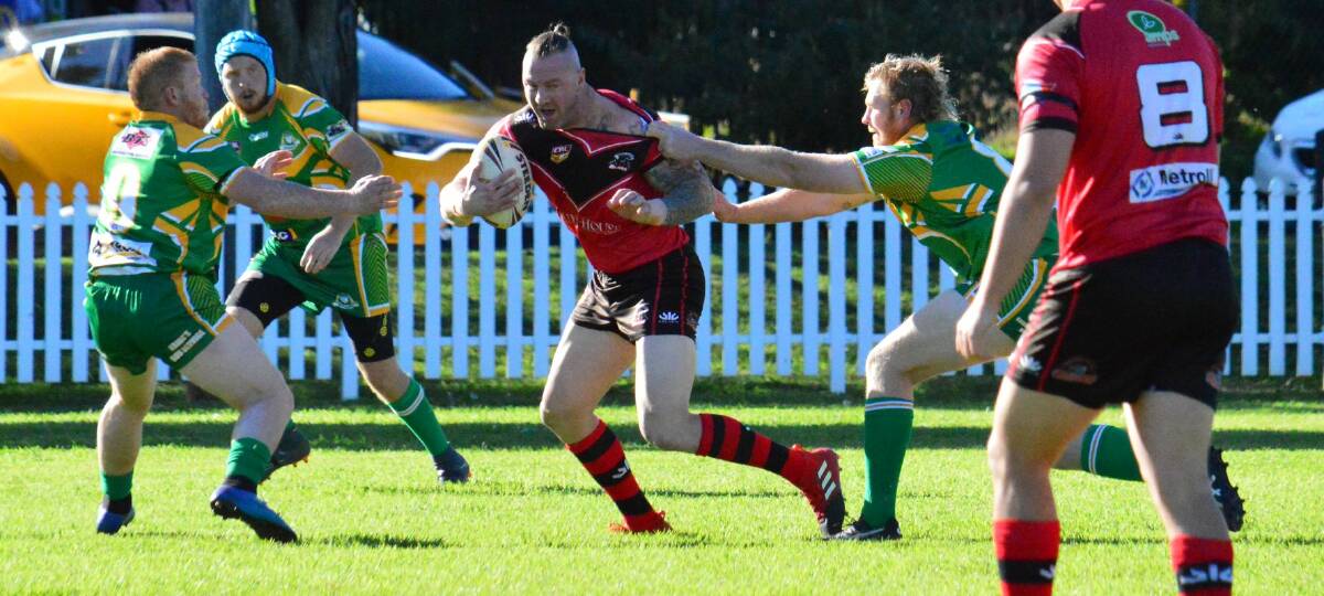 IN THE BLOOD: Josh Schmiedel in action against Boggabri on Sunday. He scored three tries in the match, which was refereed by his younger brother, Ryan. Photo: Sue Haire