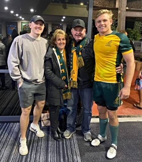 FAMILY PRIDE: Mitch Watts with his mum and dad, Debra and Stuart, and his brother, Nathan, after the Junior Wallabies' win over Fiji on Tuesday. Photo: Supplied 