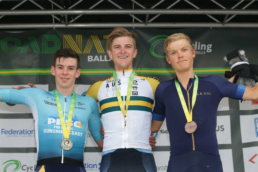 THE ARMIDALE BREEZE: Sam Jenner, right, on the podium after finishing third in the under-23 road race at the national championships at Ballarat on Saturday. The race was won by Nick White, with Michael Potter second. Photo: Dylan Burns
