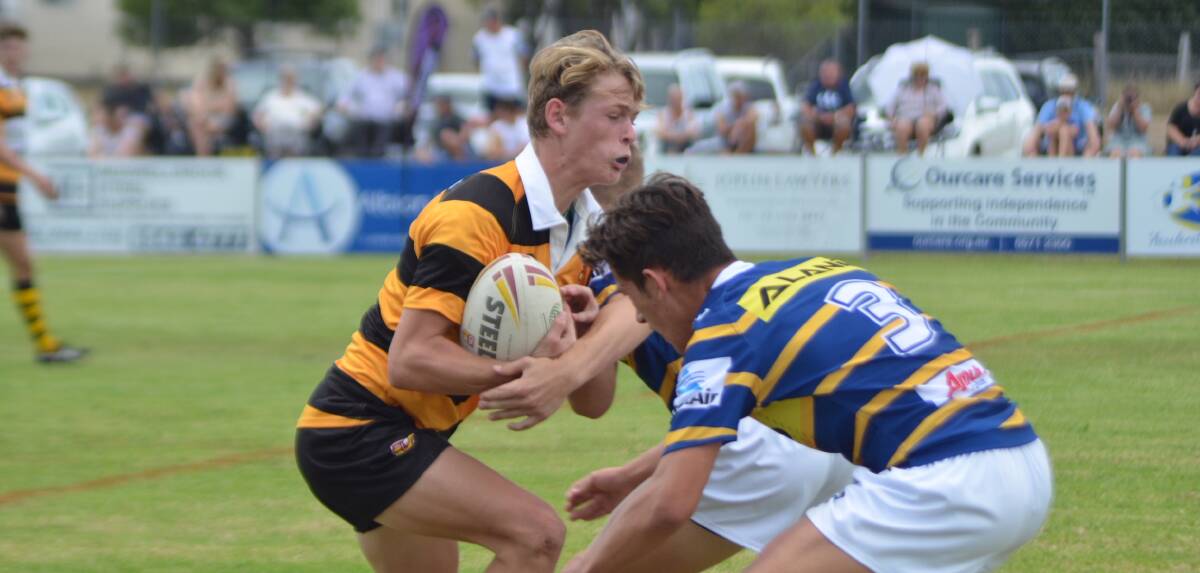 BUCKLE UP: Tiger Daltyn McCartney braces for impact against the Eels in Saturday's Andrew Johns Cup win at Singleton. Photo: Supplied