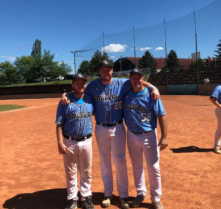 BLUE SOX BOYS: Smith, centre, with his NSW Country teammates, Brock Ridgewell, left, and John Warren. Photo: Supplied