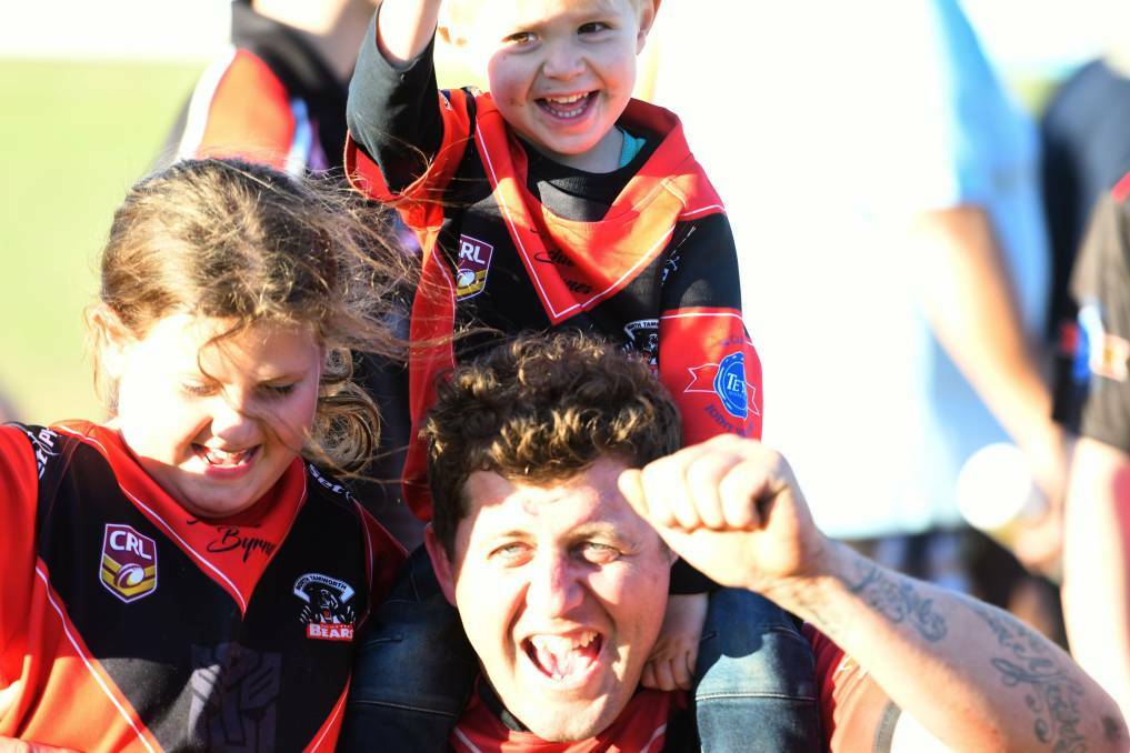 GLORY FLASHBACK: Wadwell shares the 2019 grand final celebration with his chilkdren, Ella and Hunter. 