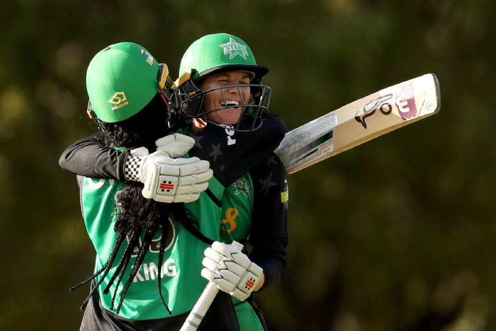 BEAUTIFUL, THAT: Erin Osborne, in a player-of-the-match performance for the Stars, celebrates after Alana King hit a six to defeat the Strikers at Karen Rolton Oval in Adelaide. AAP Image/Kelly Barnes