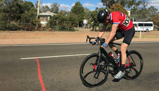 WICKED PACE: Draheim is the first through Mullaley. He had a lead of about a minute at that stage. His average speed for the 70 kilometres he completed was 40.3km/h.
