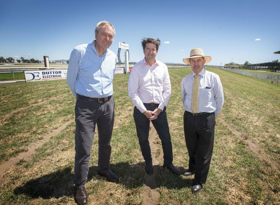 FLASHBACK: Then Tamworth Jockey Club chairman Barry Burnett, Tamworth MP Kevin Anderson and then TJC general manager Wayne Wood at the launch of the track's drainage upgrade in October. Photo: Peter Hardin