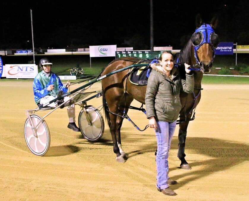 TRIPLE THREAT: Sam Ison and Roll With Tricky, along with the horse's owner, Naomi Newman, after a recent win in Newcastle. Photo: Coffee Photography