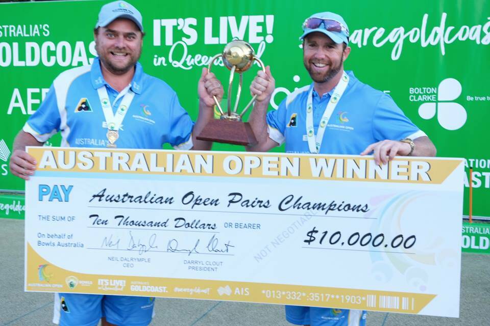 WINNING GRINS: Tamworth-raised Chris Herden celebrates his Australian Open pairs title with Carl Healey. Photo: Facebook