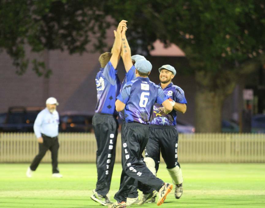 LOVE THE FEELING: Sands, left, celebrates the first of his three wickets in the one-day final.