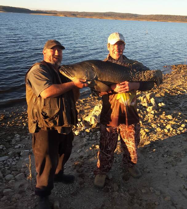 BOYS DAY OUT: David (right) lands a big one in 2018. Facebook