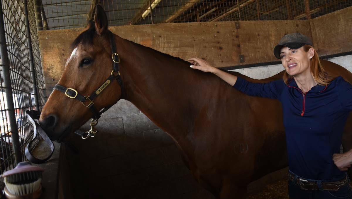 POWER OF TWO: Melanie O'Gorman and the best horse she has trained, Suncraze. Photo: Ben Jaffrey