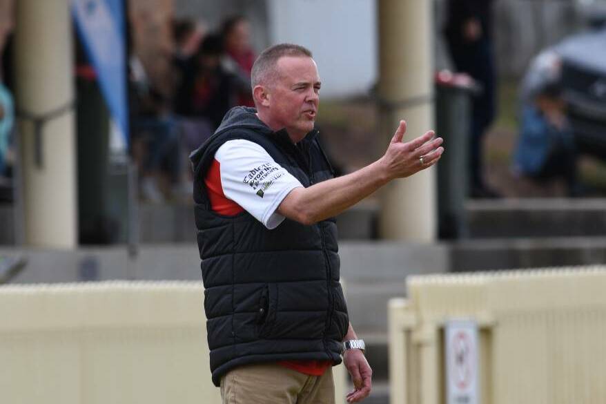 Swans coach Paul Kelly has just overseen a winless year, but he plans to stick around. Photo: Gareth Gardner