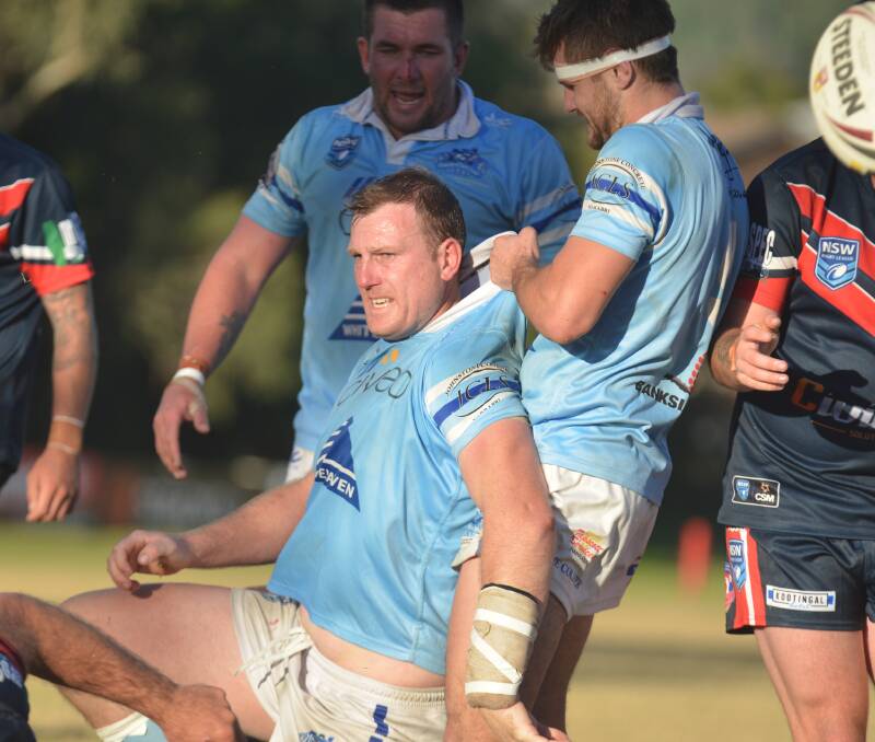 MAIN MAN: Blues captain-coach Jake Rumsby is pumped after crossing against the Roosters at Rugby Park. Photo: Mark Bode