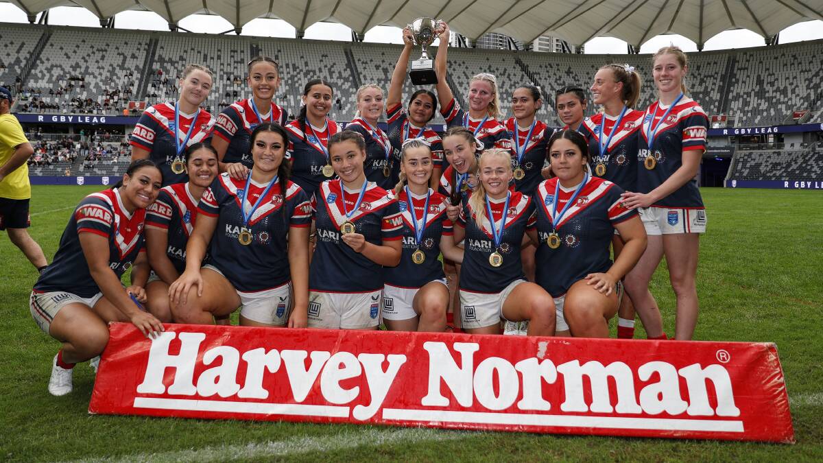 OH, YEAH! Jada Taylor (middle row) celebrates the Sydney Roosters Indigenous Academy's Tarsha Gale Cup grand final win. Photo: Bryden Sharp Photography