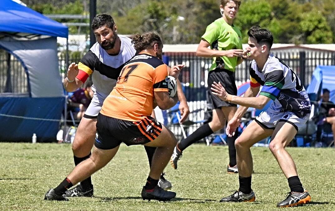 Former NRL star Tom Lahrs gets physical for the Tamworth Crows in a 24-0 win over the Tabulam Turtle Divers at the Koori Knockout on Saturday, September 30. Picture by Jason Smith