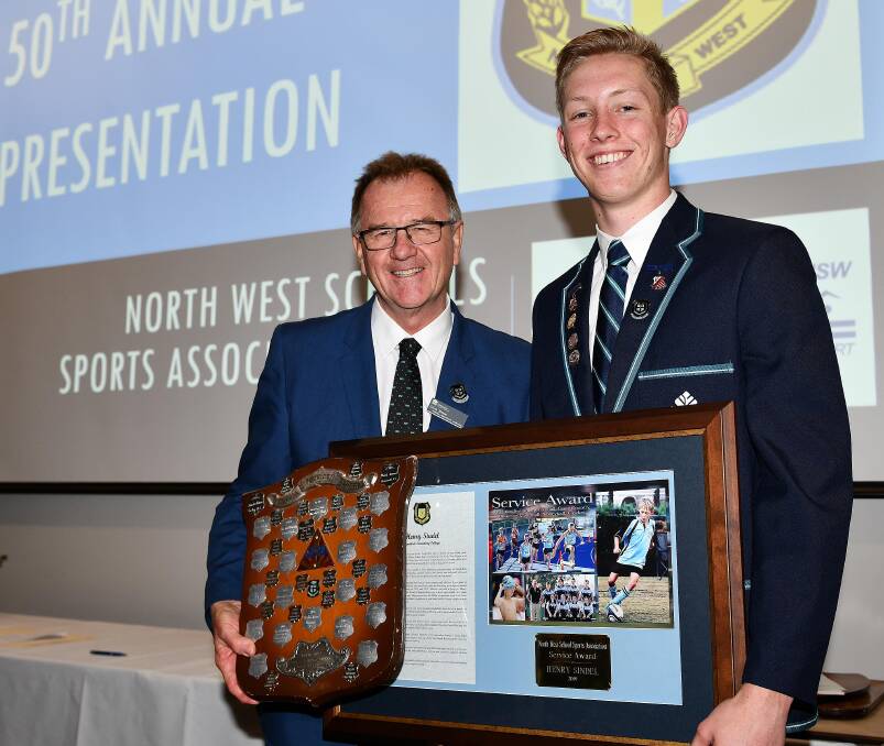 CREAM RISES: Service award winner Henry Sindel and Chris Shaw, named a North West Schools Sports Association life member at the ceremony. Photo: Paul Mathews