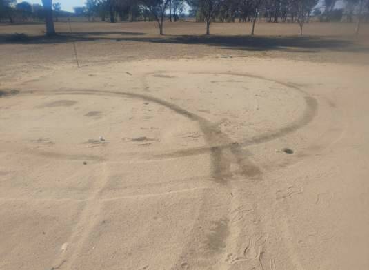 OUTRAGE: A motorbike(s) was used to do doughnuts on the second green at Bundarra Golf Club. Photo: Supplied