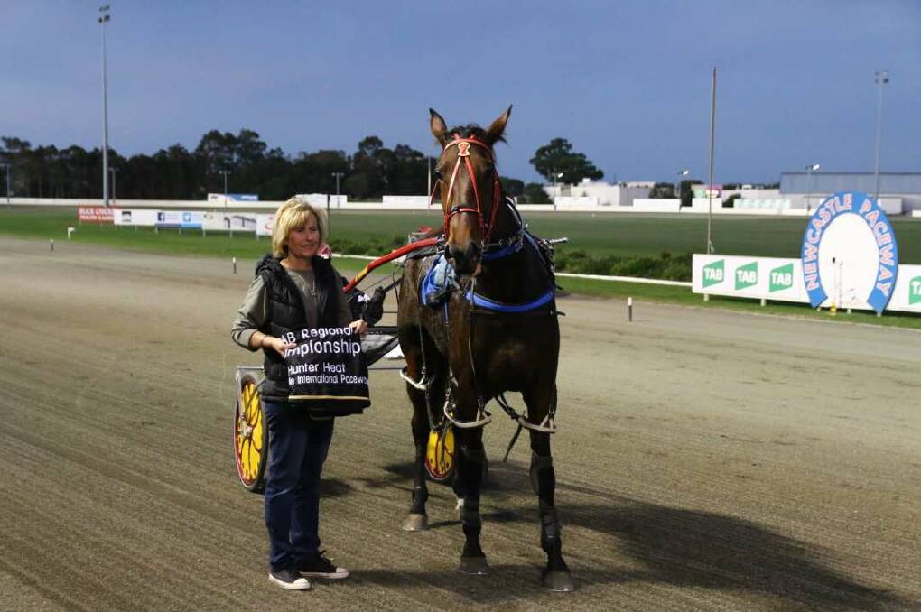 SPEED QUEEN: Emm Aye Dee and Julie Chapple, the wife of the horse's trainer-driver Dean Chapple, after winning heat one of the Hunter Regional Championships at Newcastle. Photo: Coffee Photography