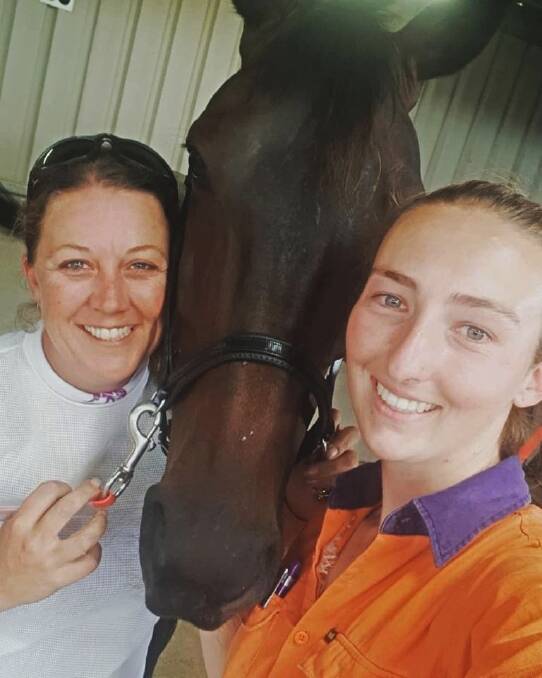 SPECIAL FLASHBACK: Mackayla Mitchell (right) and reinswoman Saraha Rushbrook after the former's debut training win, with Berling, at Canberra. Photo: Facebook

