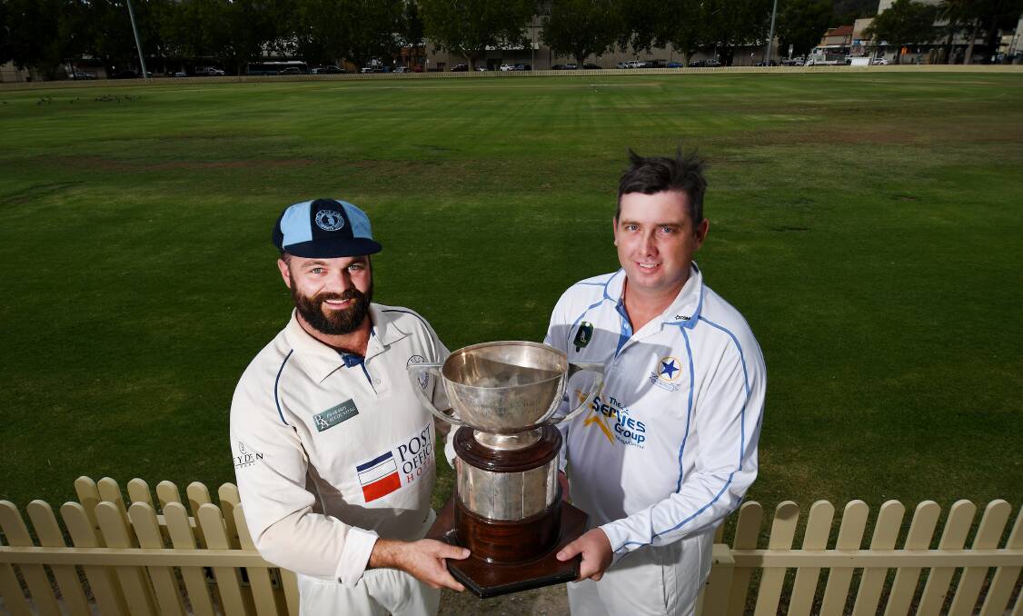 CRUNCH TIME: South Tamworth captain Mitch Smith and his Old Boys counterpart Ben Middlebrook and the prize they will be playing for this weekend. Photo: Gareth Gardner