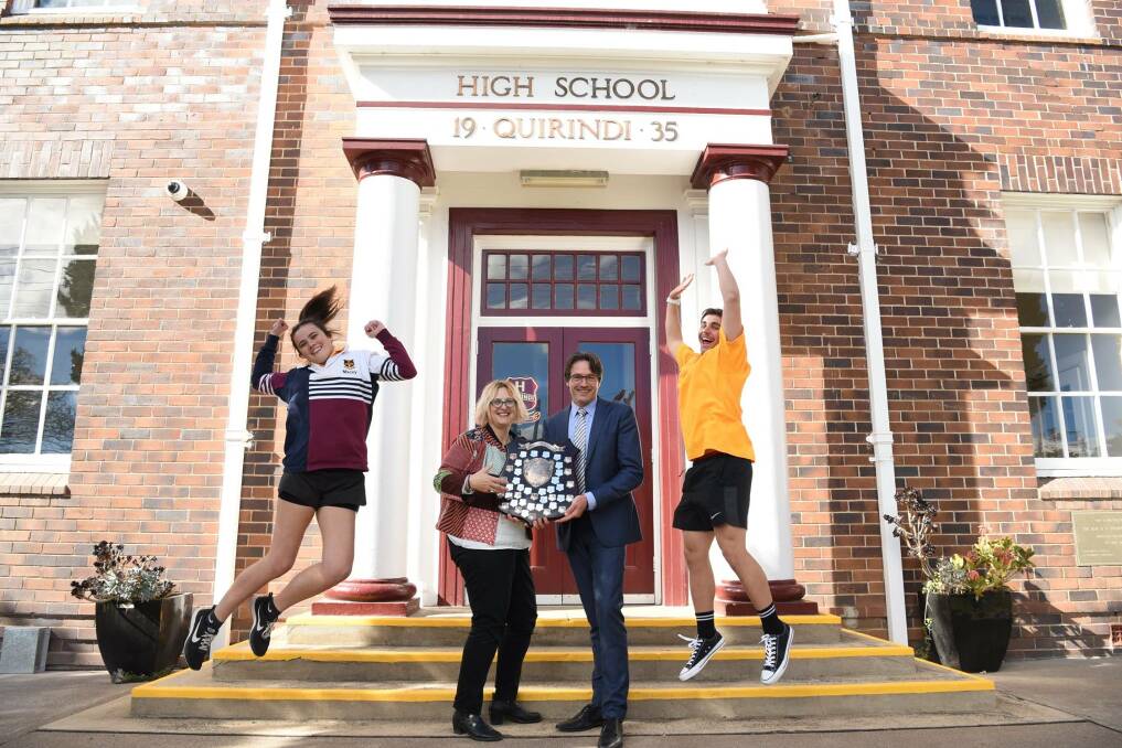 Quirindi High School sports captains Macey Patton and Tyler Thistle celebrate winning the Beau Valley Shield with the school's deputy principal Catherine Loughrey
and principal Ian Worley. Photo: Sally Alden Photography