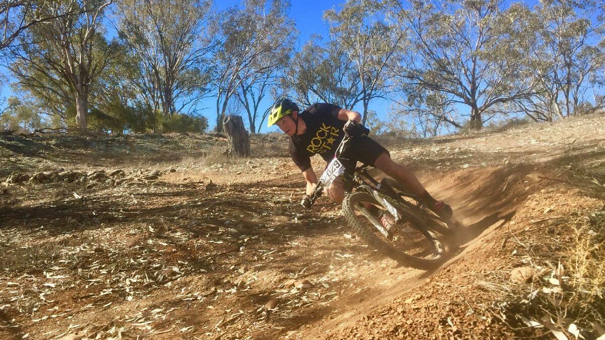 LOOSE IS GOOD: Nathan Watson feels the need for speed at Tamworth Mountain Bike Park.