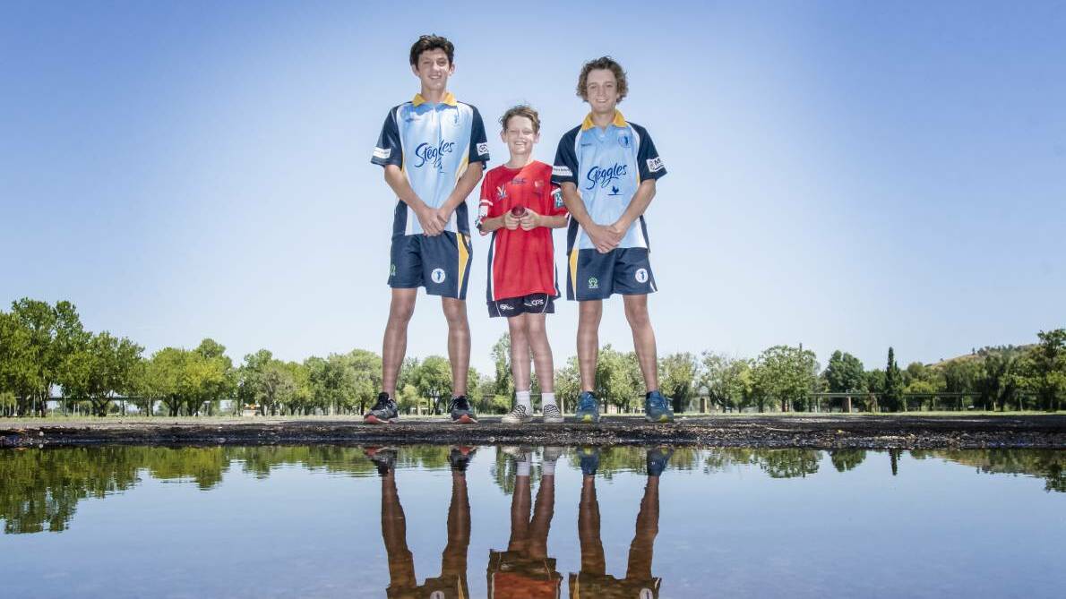 ON THE UP: Landan Price (left), with ACT/NSW Country teammates Zac Craig and Callum Henry, has been emboldened by his best cricket season. Photo: Peter Hardin