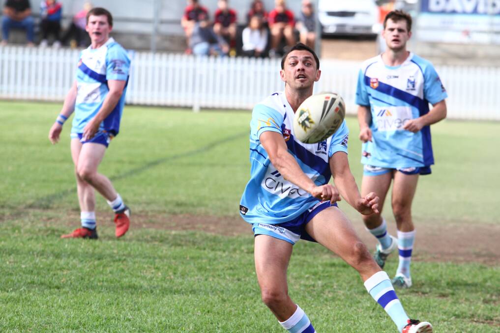 IN THE ZONE: Blues halfback Josh Tindall looks to spark something. Photo: Mark Bode