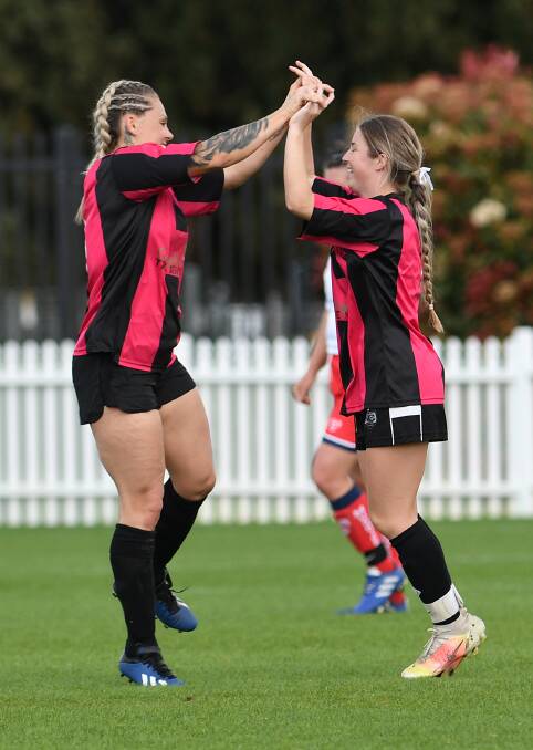 North Companions Black celebrate one of their six first-half goals against OVA White at Scully Park on Saturday. They led 6-0 at half-time. Picture by Gareth Gardner 