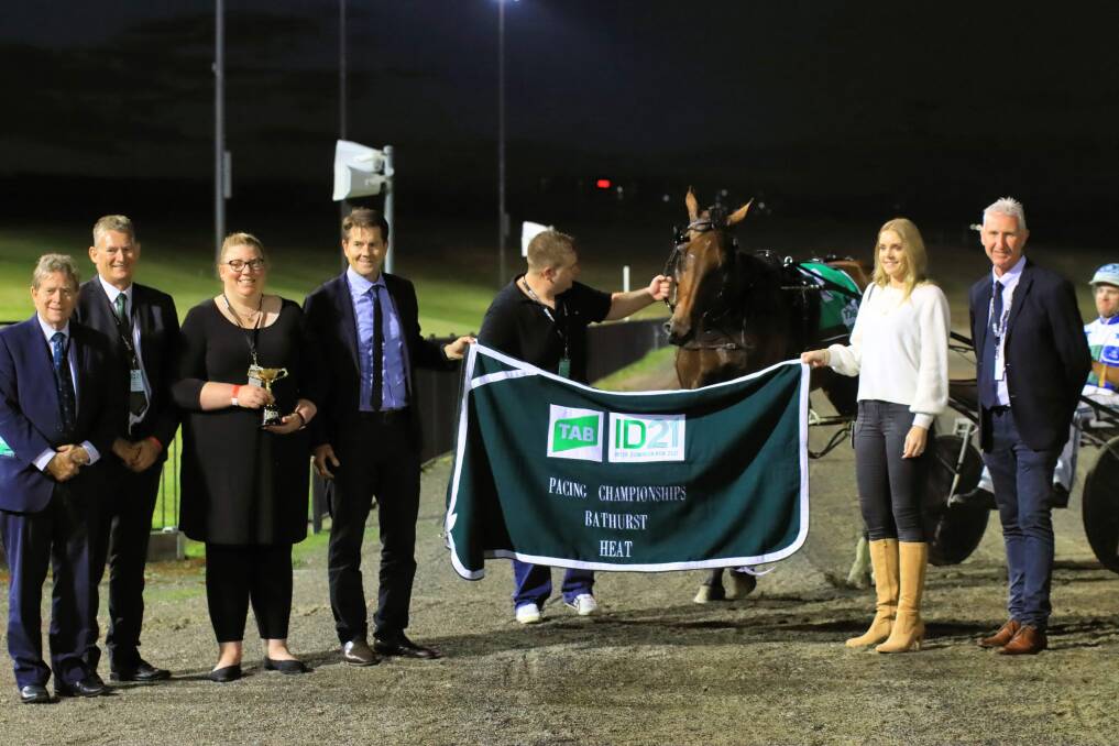 FOR POSTERITY: Member for Tamworth Kevin Anderson with the connections of Expensive Ego, who won heat two of the Inter Dominion at Menangle on Saturday. Photo: Supplied