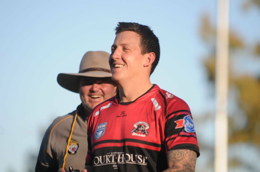 SPITTER CAM: Brad McManus shares a joke with Bears prop Tom Woolaston at Jack Woolaston Oval this year. Photo: Mark Bode