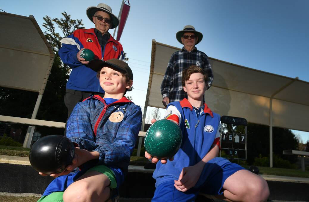 BOWLS IS BACK!: Front Jaiden Elliott, 10, and Dominic Elliott, 12, the grandchildren of Greg Roese (left). Also pictured is Ian Bannister. They are at Tamworth City Bowling Club.
