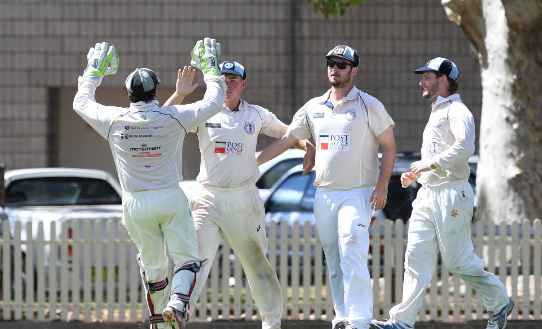 THE END IS NIGH: Souths celebrate another wicket. Photo: Gareth Gardner 