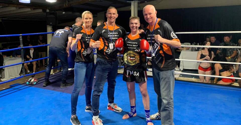 AWESOME FOURSOME: Tamworth fighter Josh McCulloch with his team, Kristie, Scott and Clint Chaffey, after his most recent win. Photo: Facebook