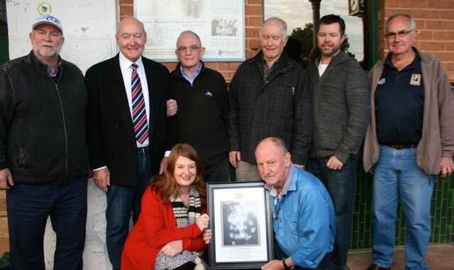 RESPECT: A plaque honouring Dally Messenger is unveiled at the Royal Hotel in Manilla in 2015. Back row from left: Neville Glover, John Quayle, Dally Messenger III, Ken Messenger, Cameron Dally Messenger, Trevor Hatch, Genevieve Messenger and Tom Cocking. Photo: dallymessenger.com