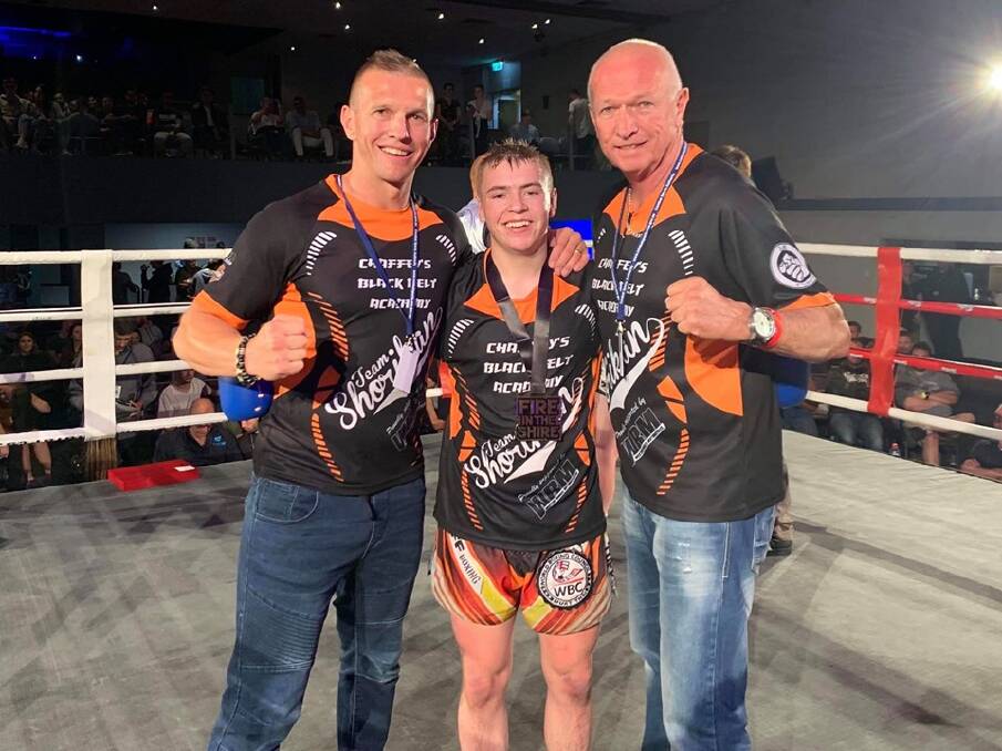 POWER PUNCH: Josh McCulloch, the 2019 Tamworth sportsperson of the year, with two members of his team, Scott Chaffey (L) and Clint Chaffey. Photo: Facebook