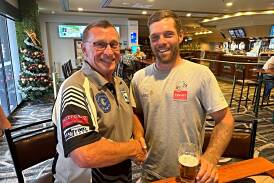 Werris Creek coach Rocky Stewart and Mitch Doring shake on it after the playmaker signed with the club at Wests League Club on Friday, November 24. Picture supplied