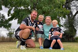 Beau Parry's No. 1 supporters: his fiancee Emma Bates and his boys, Cooper, left, and Korbin. Picture by Mark Bode