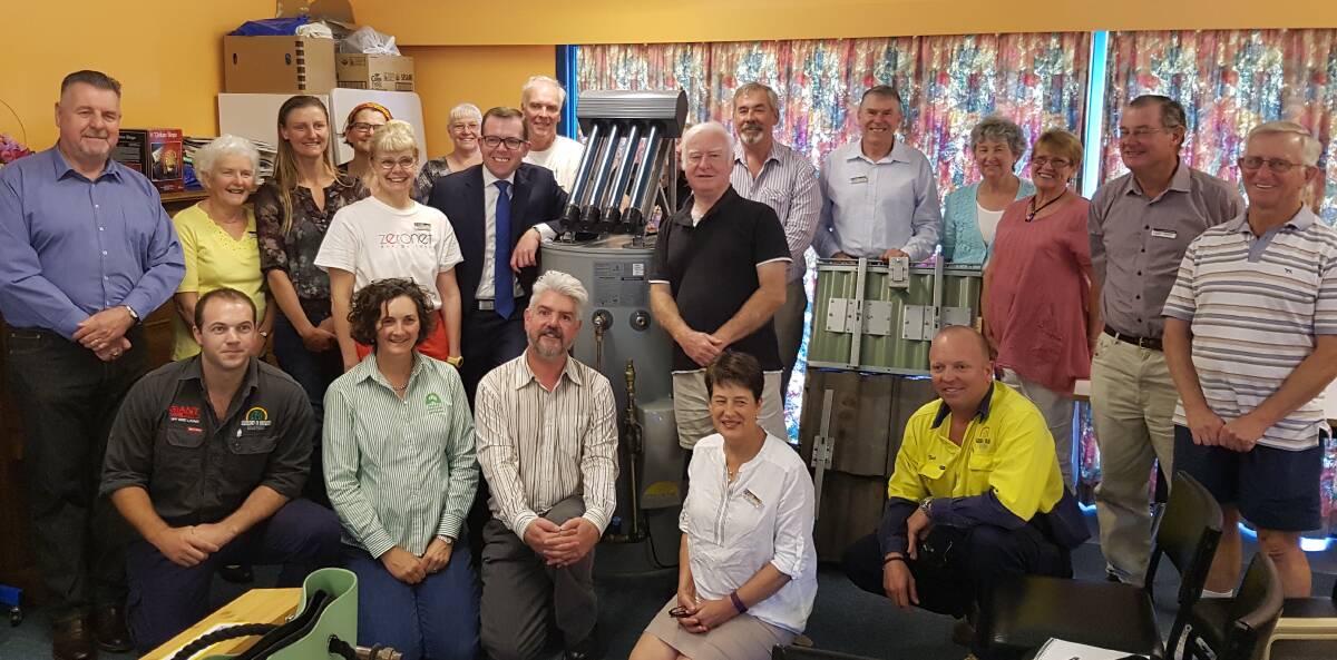 Bulk buy: Community members attend the launch of a second bulk-buy of evacuated tube solar hot water systems, run by Starfish's Adam Blakester, in Uralla on Wednesday.